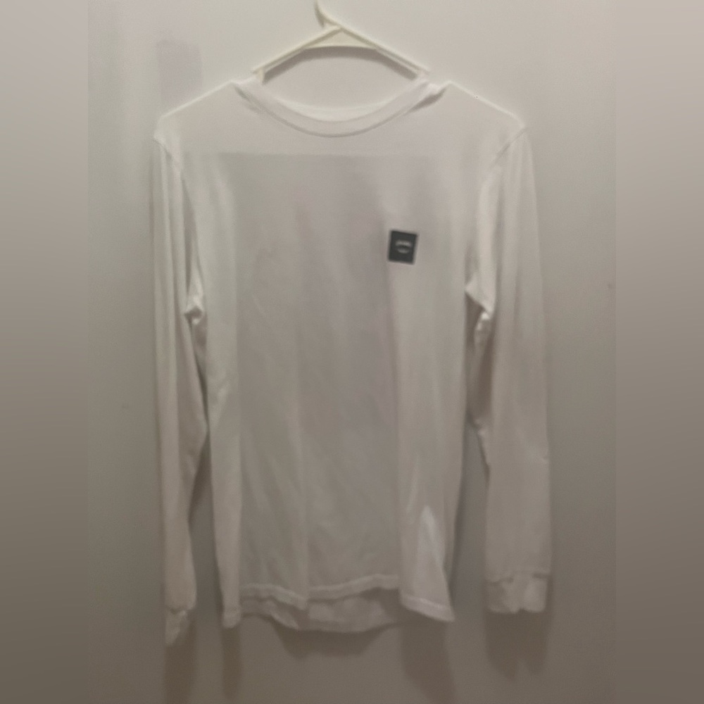 White long sleeve shirt with design on back